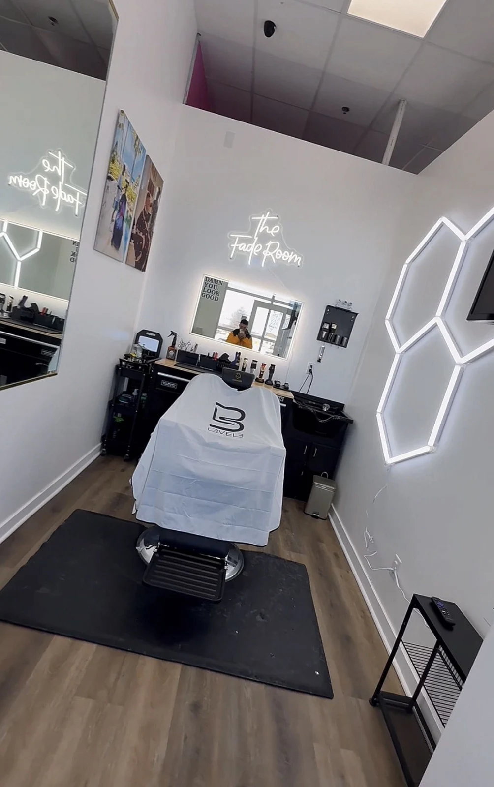 The Fade Room's private barber chair, mirror and geometric wall lights